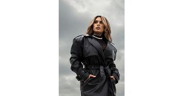 Women’s winter trench leather coat styled with turtleneck and boots – elegant winter outfit 2025