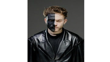 Model wearing black and brown men’s leather blazers from Bari Skins during seasonal sale – luxury real leather jackets at exclusive discounts.