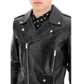 Men’s black moto jacket – close-up of zippers and lapel collar