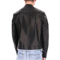 Rider wearing slim fit black real leather motorcycle jacket – outdoor fashion shot