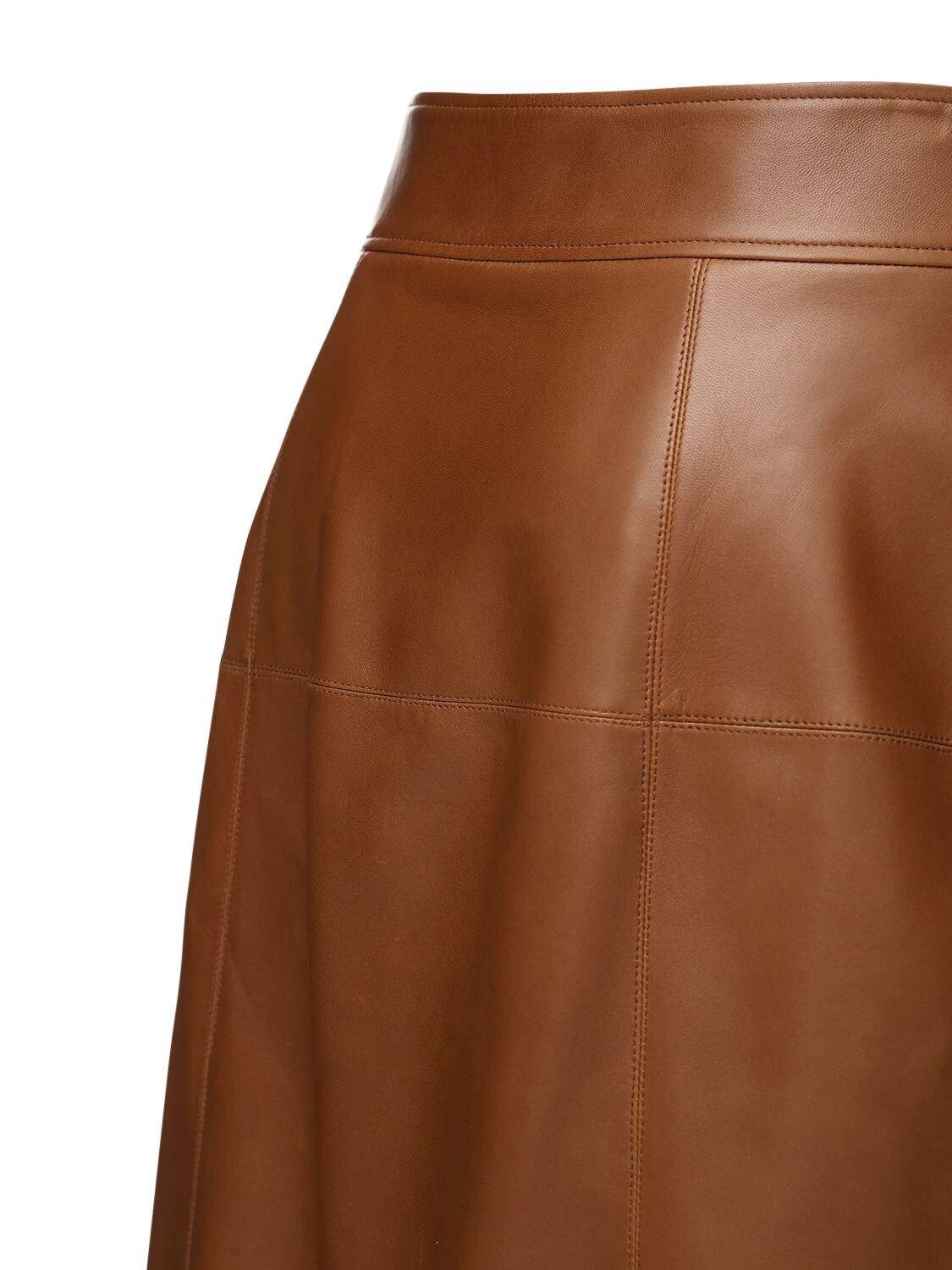 Snap-Button Front A-Line Leather Skirt – Close-Up.