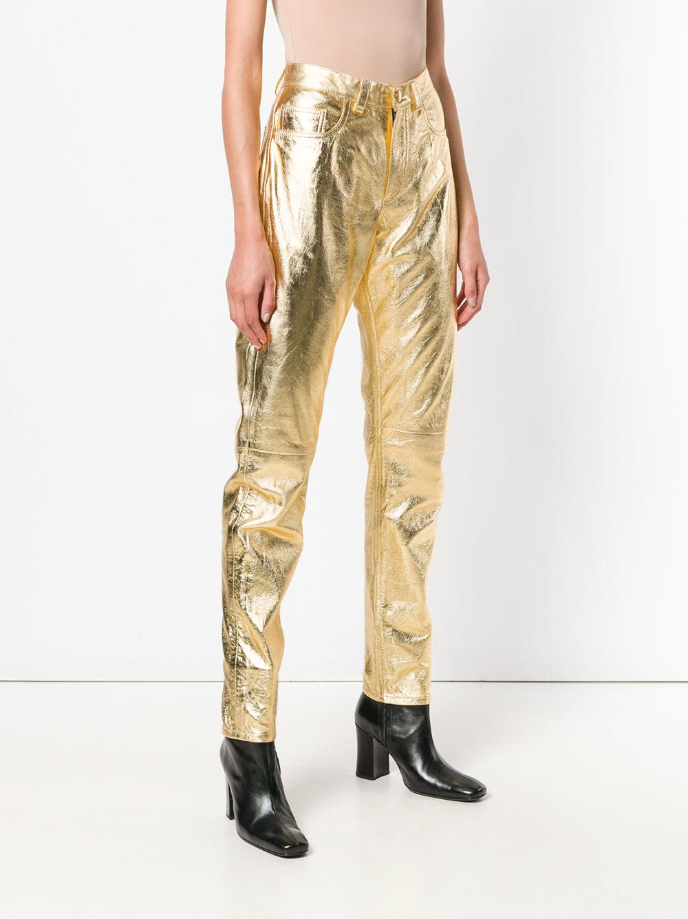 Slim-fit Women's Gold Metallic Leather Pants - Genuine Lambskin showing tailored leg cut and metallic sheen.