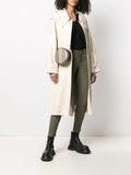 Model styled in Women's Olive Green Leather Pants - Slim Fit Lambskin with boots and oversized blazer.