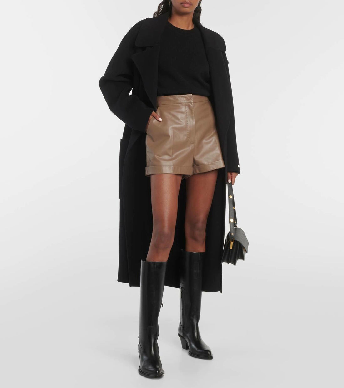 Women's real leather brown high-waisted shorts front view.